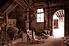 Werklust3 -  Interieur Nieuw Werklust Kleiwarenfabriek te Hazerswoude, vanuit opslagruimte met fel licht achter openstaande deur en raam 