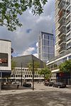 Overzicht gedeelte rechter zijgevel, vanuit een zijstraat - Rotterdam - 20357641 - RCE -  Concert- en congresgebouw De Doelen: Overzicht gedeelte rechter zijgevel, vanuit een zijstraat (opmerking: Gefotografeerd voor Toonbeelden van de Wederopbouw)