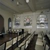 Interieur, trouwzaal met glas-in-loodramen (voorstelling: geschiedenis van de baggerindustrie)