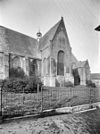 Deel schip zuidtransept en sacristie gezien vanuit het zuidwesten - Naaldwijk - 20161483 - RCE -  Nederlands Hervormde Kerk: Deel schip zuidtransept en sacristie gezien vanuit het zuidwesten 
