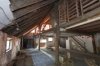 Interieur schuur, overzicht kapconstructie gezien vanaf gevel voorhuis